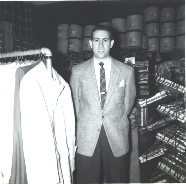 Lee Ciccarelli on the floor at the Varsity Shop, June 1956